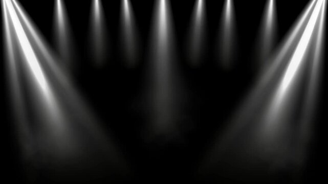 Spotlights project intense white beams across a dark, hazy void to create a theatrical stage setting that emphasizes depth and high-contrast lighting for professional photography or video production.