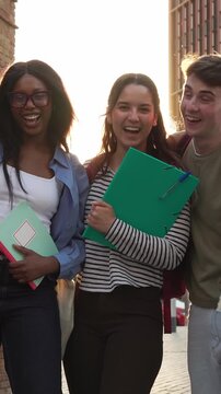 Diverse group of college students laughing together