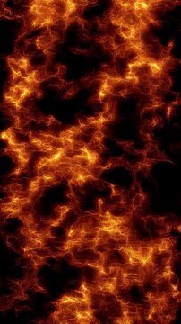 Intense fire flames on an empty black background, vertical photo featuring dramatic blazing fire, glowing embers and powerful heat effects