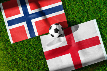 Fototapeta premium Norway vs England, Quarterfinals 2026 tournament. Illustration image, national flags before international football match, football ball on green grass 