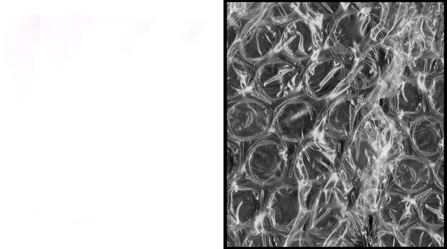 Grey, metallic bubble wrap texture, close-up, industrial background, packaging material