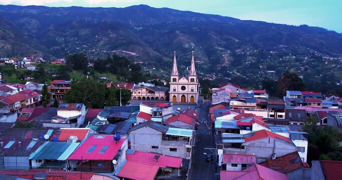 Aerial view of the beautiful church and central park in Chordeleg Ecuador shot with a drone on a sunny day perfect for travel tourism and showcasing colonial architecture