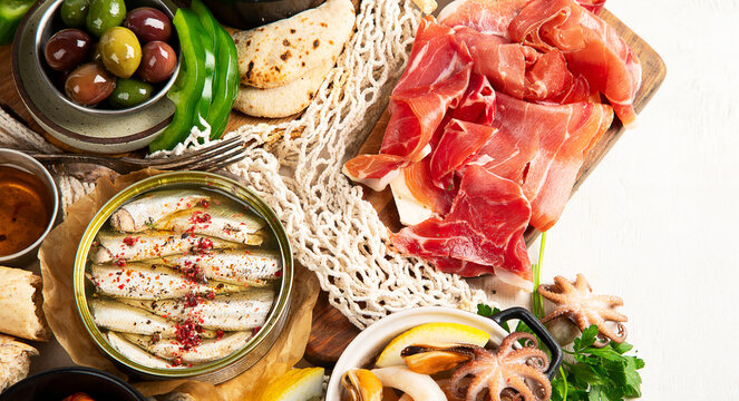 Tapas - Spanish food. Set of different delicious appetizers.