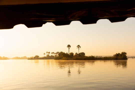 palm trees on the Zambezi River, Zimbabwe, Africa at sunrise