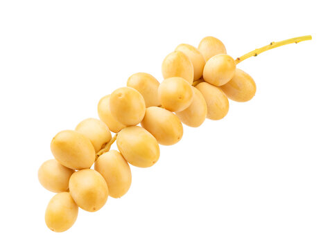 Fresh yellow dates isolated on white.
