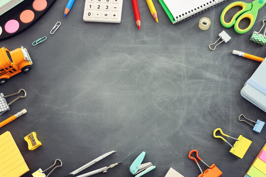 Back to school concept over classroom blackboard. Top view