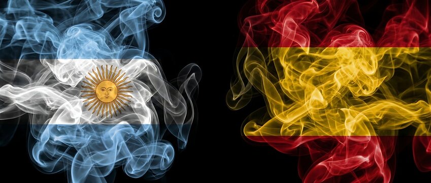 Argentinian flag smoke versus Spanish flag smoke on black background, symbolic representation of national pride, cultural relations and friendship.