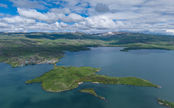Akcakale Island and Historic Castle Ruins on Cildir Lake in Ardahan Province Turkey Eastern Anatolia Drone View