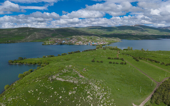 Akcakale Island and Historic Castle Ruins on Cildir Lake in Ardahan Province Turkey Eastern Anatolia Drone View