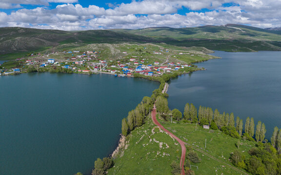 Akcakale Island and Historic Castle Ruins on Cildir Lake in Ardahan Province Turkey Eastern Anatolia Drone View