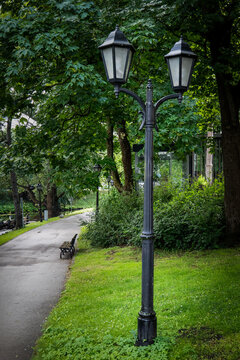 Classic Street Lamp Along a Peaceful Park Path