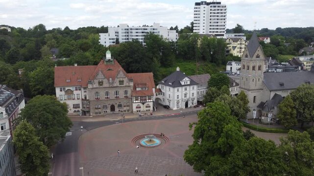 Aerial View Market Square with Town Hall and Town Church in Bergisch Gladbach, North Rhine-Westphalia, Germany 4k