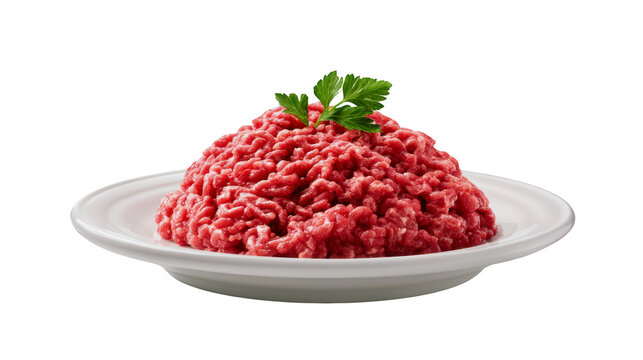 Fresh ground beef meat pile served on a white ceramic plate isolated on transparent background