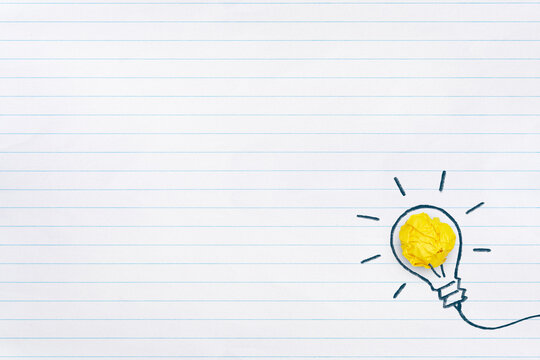 Creative idea. Concept of idea, innovation and Inspiration on white notebook paper background with copy space