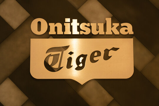 Bangkok, Thailand -October 27, 2024: close up Onitsuka Tiger store sign. A Japanese fashion brand
