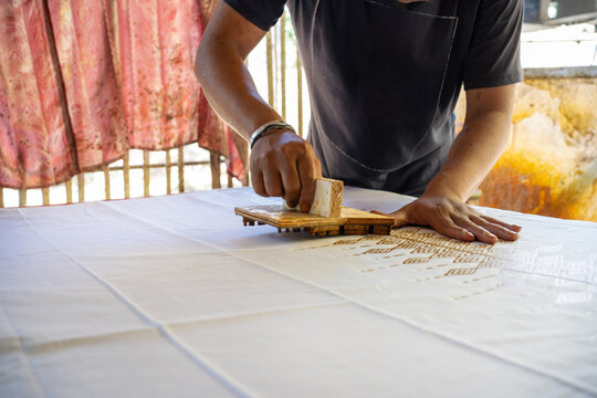 Traditional Batik Fabric Printing with Geometric Motif Pattern
