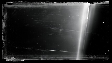 Obraz premium Vintage Distressed Analog Film Frame Overlay with Scratches Dust and Light Leak Texture