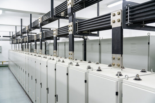 Industrial electrical distribution panels and busbars in a modern facility