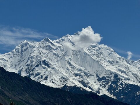 Majestic Rakaposhi Mountain Under a Deep Blue Sky in Nagar Valley, Gilgit-Baltistan, Pakistan