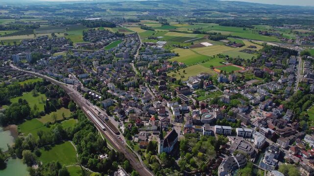 Aerial view around the old town of the city Cham, switzerland on a sunny spring morning