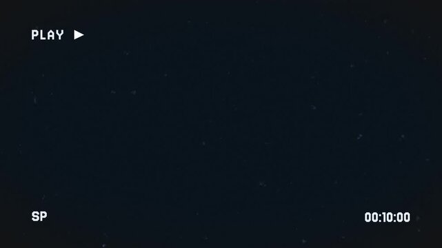 4K Retro VHS Tape Playing Capture with Analog which is given a noise effect on a black background.