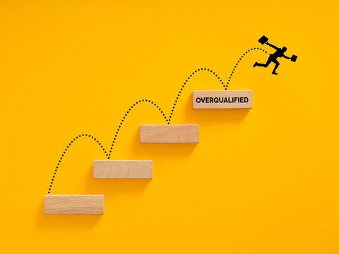 Overqualified businessman jumping career steps on yellow background