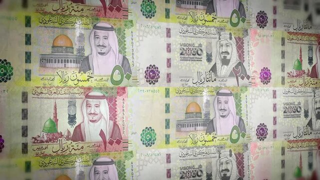 Saudi Arabian currency notes background showcasing financial backdrop, 4k footage close up