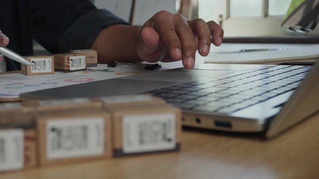 Business professional using laptop to approving digital partnership agreement, procurement workflow, contract management and supplier collaboration in modern office