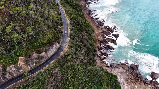 Cliffs over Arctic ocean in aerial vertical panorama of Great Ocean road in Australia.
