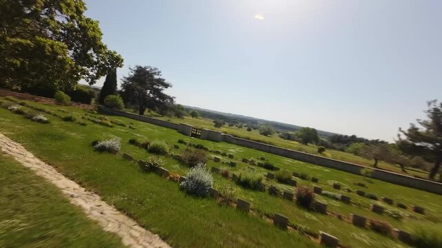 Aerial perspective moving over the graves at the lone pine cemetery and memorial in Gallipoli, Turkey, oe01