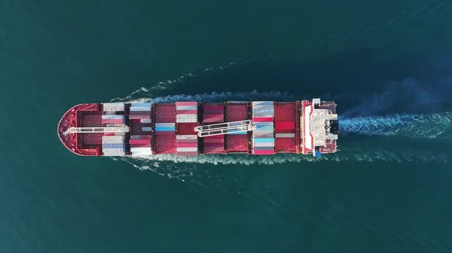 Cargo container Ship, cargo maritime ship with contrail in the ocean ship carrying container and running for export concept technology freight shipping sea freight by Express S