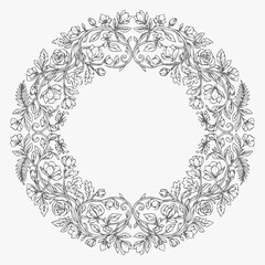Obraz premium Intricate circular floral wreath frame with detailed leaves and blossoms, decorative border design.