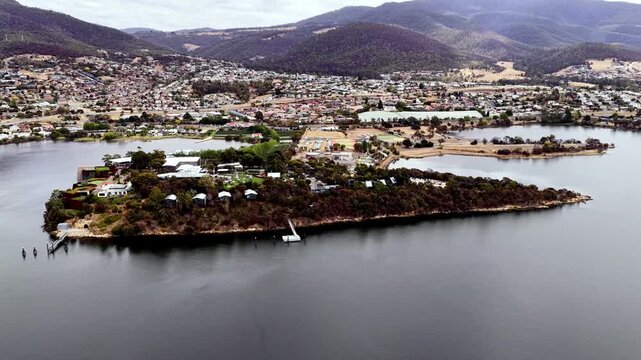 Headland on Derwent river Greater Hobart aerial cityscape view of modern museum complex.