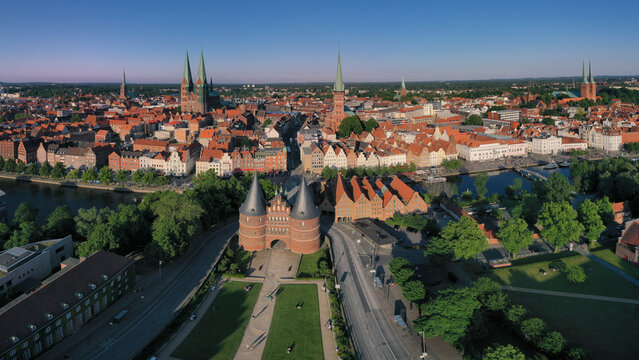 Germany, Schleswig-Holstein, Lubeck, Aerial view of Holsten Gate at dusk