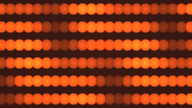 Bright orange light pattern across horizontal lines