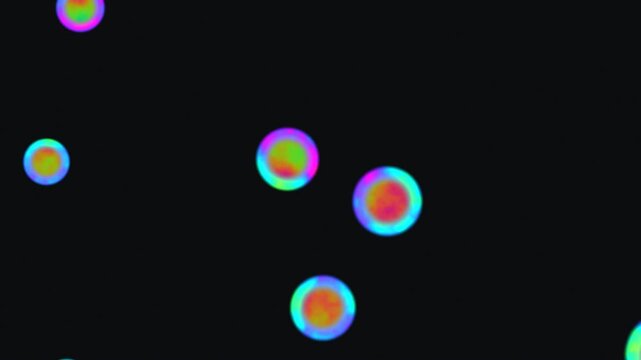 Colorful circles floating in dark background