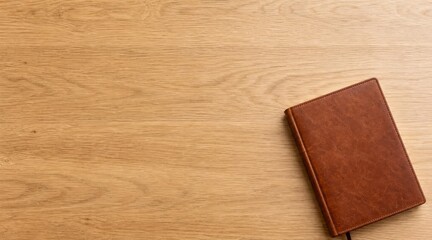 Fototapeta premium Leather Journal on Minimalist Wooden Desk
