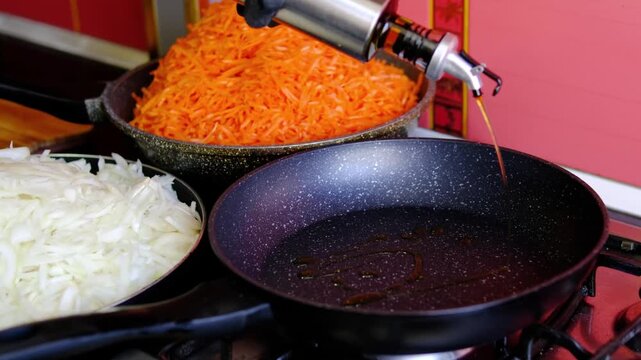 Cooking chopped onion and grated carrot in frying pan with vegetable oil preparing classic homemade base for soups sauces and everyday meals