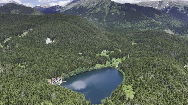 Cinematic Drone View of Karagol Lake in Savsat Artvin Turkey Surrounded by Misty Forest and Black Sea Mountain Landscape