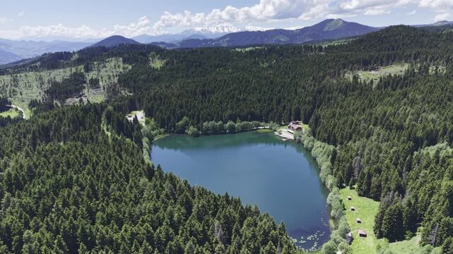 Cinematic Drone View of Karagol Lake in Savsat Artvin Turkey Surrounded by Misty Forest and Black Sea Mountain Landscape