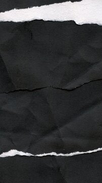 Random stop motion abstract dark grunge texture background with white torn paper layers