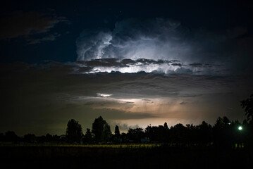Obraz premium Lightnings thunderstorm clouds night