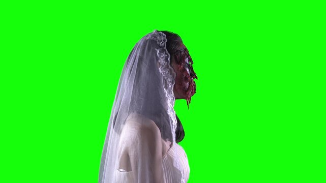 Side Profile of Spooky Zombie Bride with Bloody Face on Green Screen