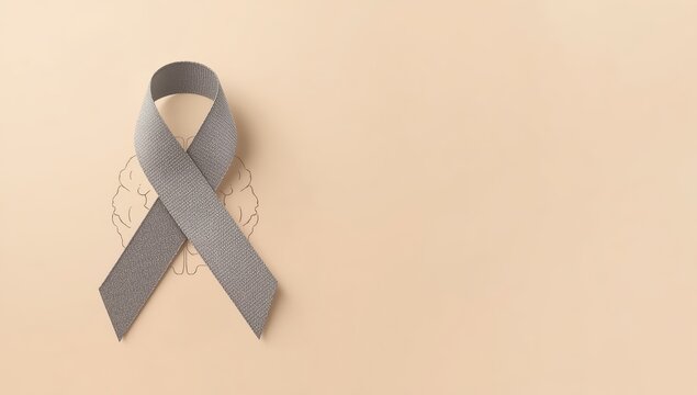 Beige backdrop with a grey awareness ribbon. Brain cancer theme.
