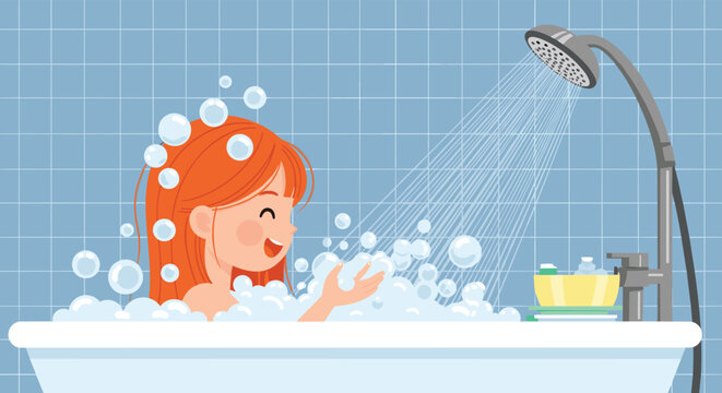 Smiling girl with red hair enjoys a bath with plenty of bubbles in a blue tiled bathroom while playing with foam under the shower.
