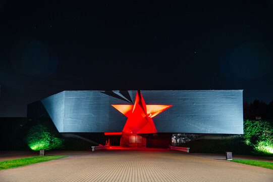 Brest, Belarus - 09.16.2025: the main entrance to the Brest Fortress is a red-lit star