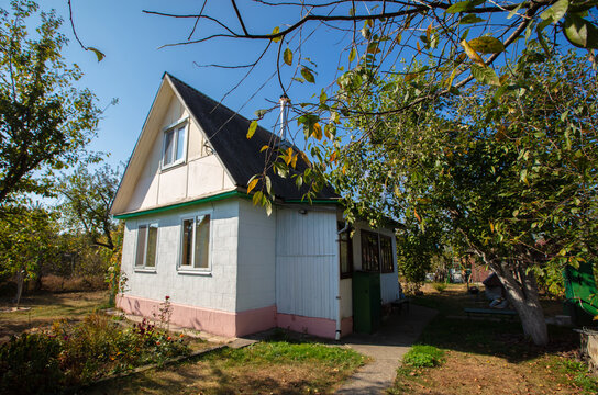 Small country house with a plot. Typical houses given in the post-Soviet space.