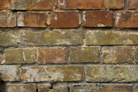 Brick wall with signs of aging.