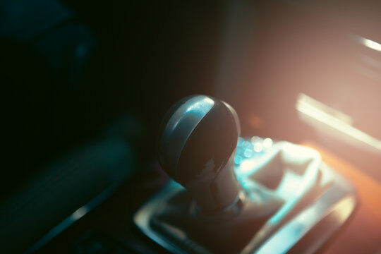 Close up of a gear stick in a car.
