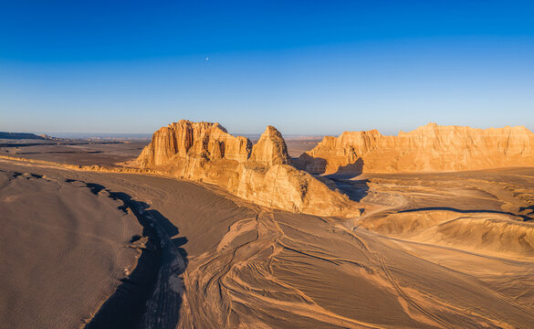Aerial view of majestic yardang landforms in Gobi Desert at sunset, Dahai Dao, Xinjiang, China